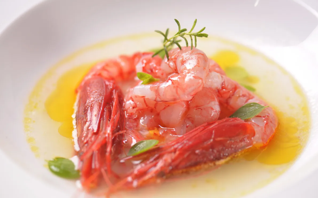 Red prawn crudo with olive oil and herbs
